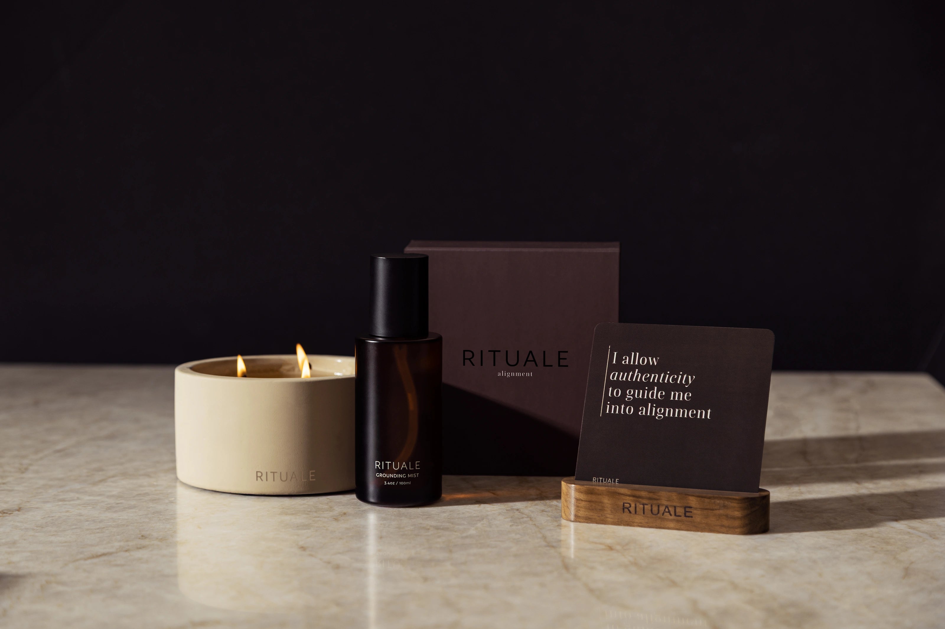 Rituale trio collection with grounding mist, concrete candle, and alignment card